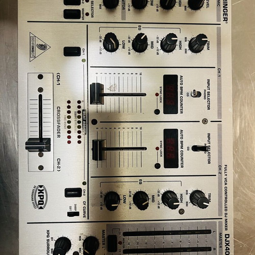 Behringer DJX400 DJ mixer used with 2 channels and BPM counters