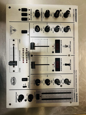 Behringer DJX400 DJ mixer used with 2 channels and BPM counters