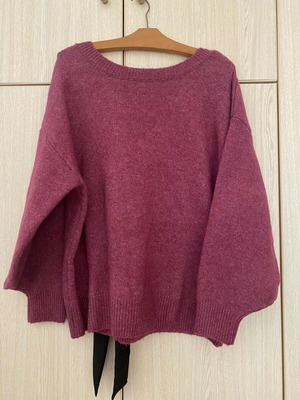 Knit sweater like new with back tie size M