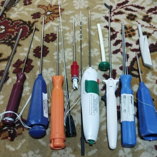 Orthopedic anchor and suture surgical tool set