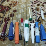 Orthopedic anchor and suture surgical tool set