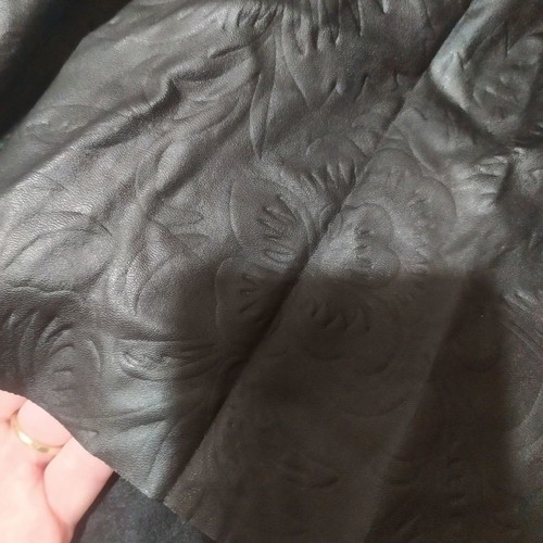Leather skirt used with embossed flowers