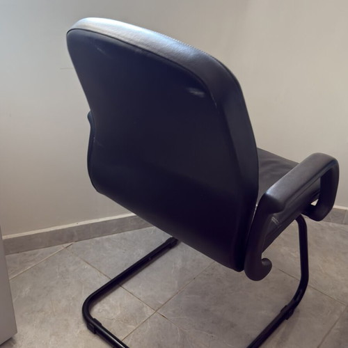 Leather office chair used with soft seat and armrests
