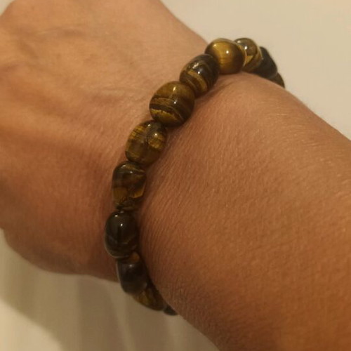 Bracelet with tiger's eye semi-precious stones like new, elastic