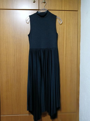 Black sleeveless dress with high neck and pleated hem, like new, size Large