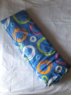 Single quilt used with slight wear