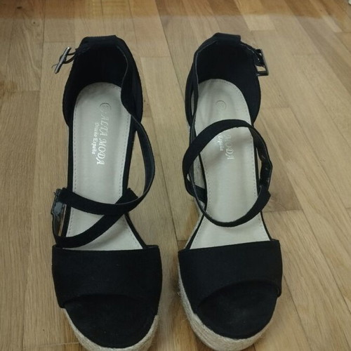 Black platform shoes used with strap wear, size 39