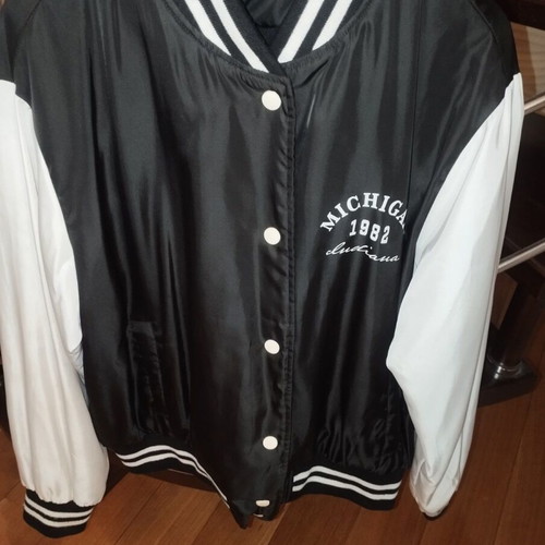 Only college style jacket like new, black and white, medium