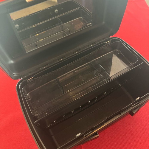 Delsey travel makeup case like new, sturdy black with inner pockets