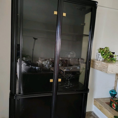 Wooden showcase like new, black with interior light and 8 deep shelves
