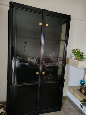 Wooden showcase like new, black with interior light and 8 deep shelves