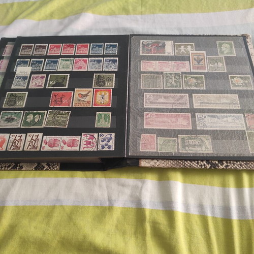 Stamps like new, 702 pieces with album