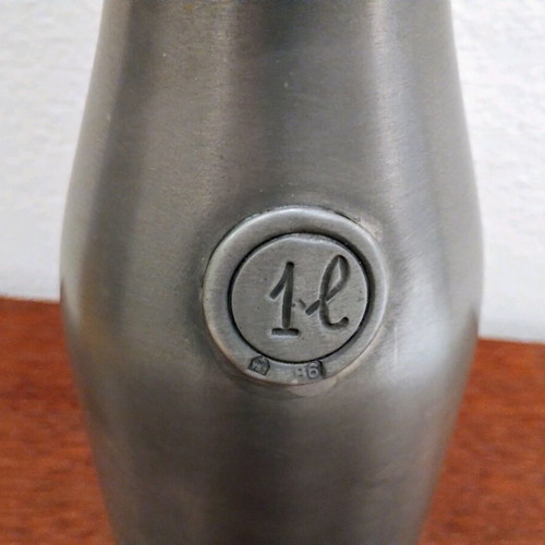 Tin bottle new handmade with authenticity stamp