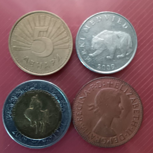 Foreign coins used, lot of 4 pieces