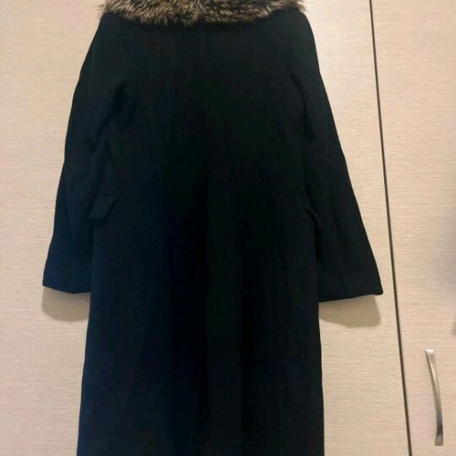 Black coat like new with fur collar and back slit