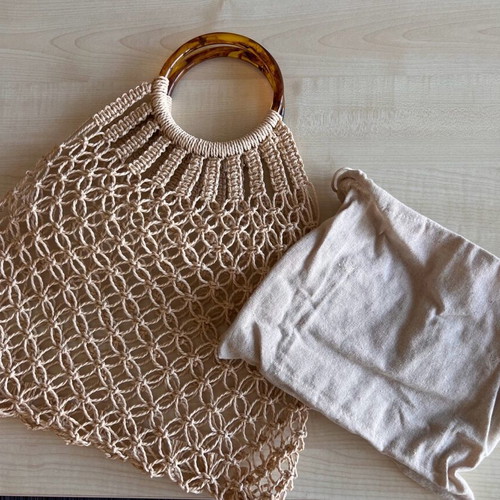 Raffia bag like new with tortoiseshell handle and cotton interior