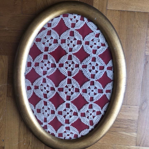 Framed artwork with gold wooden frame and glass used, handmade crochet
