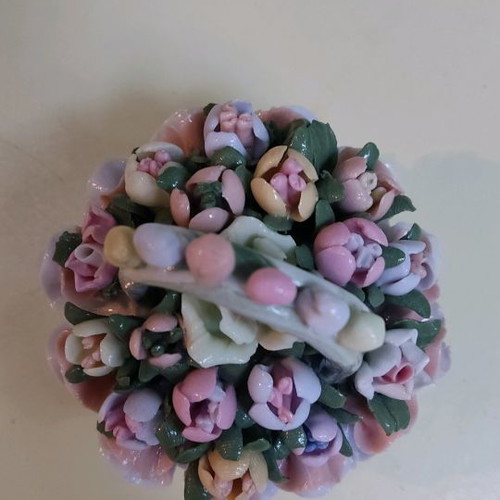 Ceramic decorative basket with flowers used