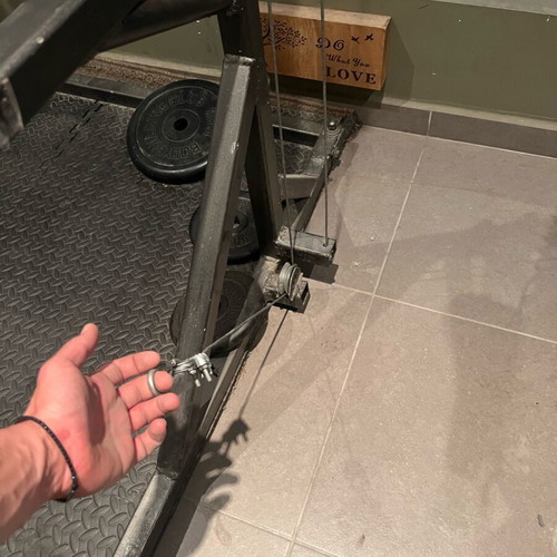 Training rack with barbell and pulley system