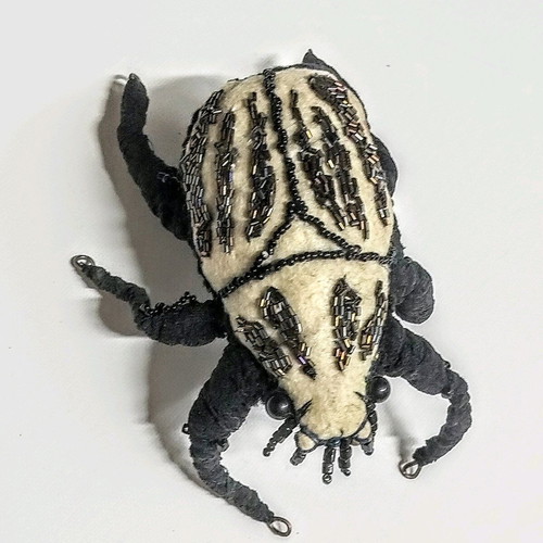 Art object Beetle new fabric with beads