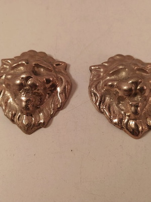 Bronze lion heads set of two like new