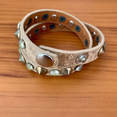 Bracelet with studs and transparent stones like new, beige and silver