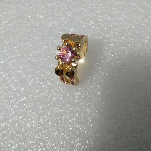 Ring with pink stones like new, gold plated size 6
