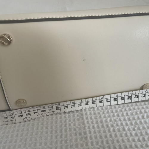 Axel shoulder bag like new, cream color