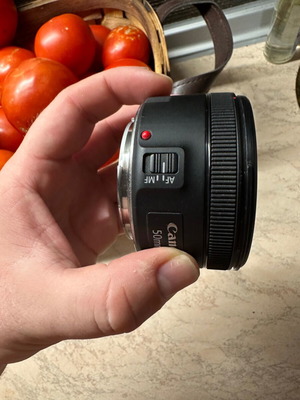 Canon 50mm f1.8 lens with hood