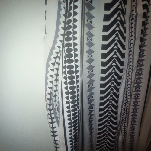 One-piece jumpsuit size S with slanted pockets and belt
