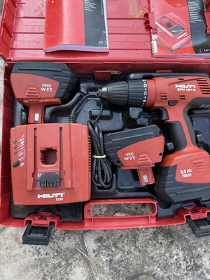 Hilti Cordless Hammer Drill like new with charger and 3 batteries