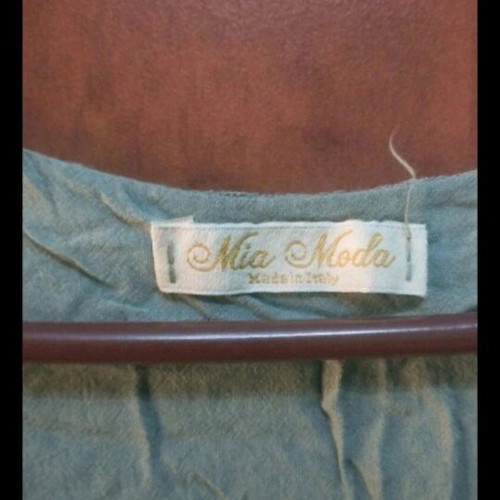 Khaki blouse short front and long back new, one size
