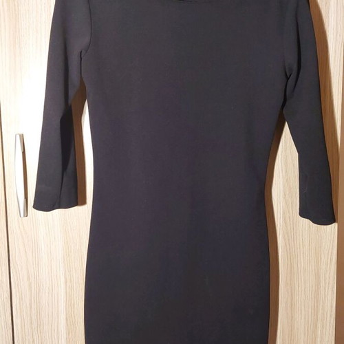 Mini black dress like new with zipper and gold details