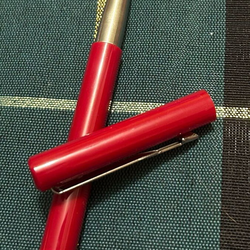 Parker roller ball new, burgundy with silver, blue ink