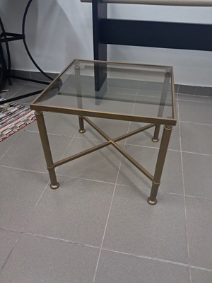 Square coffee table with glass top