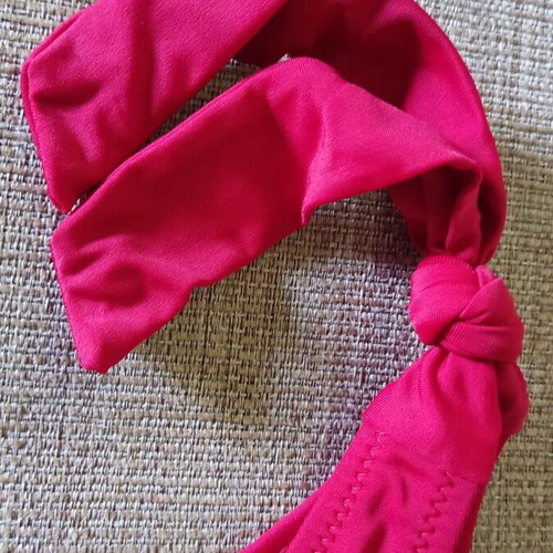 Red swimsuit size 50 like new, side tie