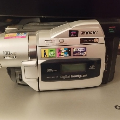 Sony Handycam DCR-TRV820E digital video camera used with printer, battery, charger