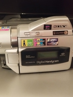 Sony Handycam DCR-TRV820E digital video camera used with printer, battery, charger