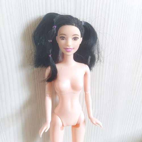 Barbie doll Asian with facesculpt Olivia and articulated body