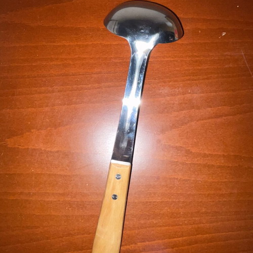Stainless steel serving ladle with wooden handle