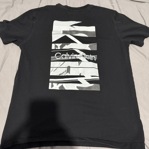 Calvin Klein black T-shirt used, fits XL and L
