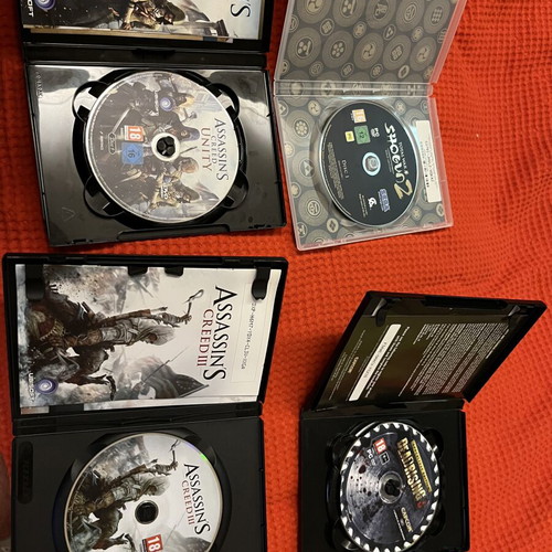 PC Games pack of 4 like new with Assassin's Creed, Total War Shogun 2, Dead Rising 3