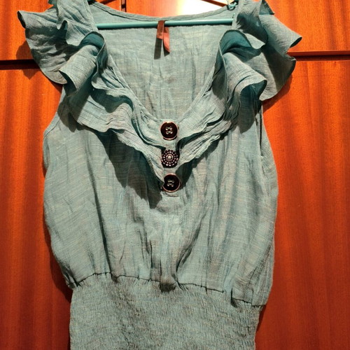 Blouse sleeveless turquoise size S used with decorative buttons