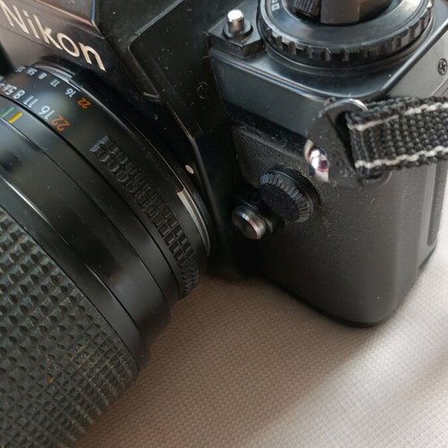 Nikon F301 camera used with 35-135 lens and flash