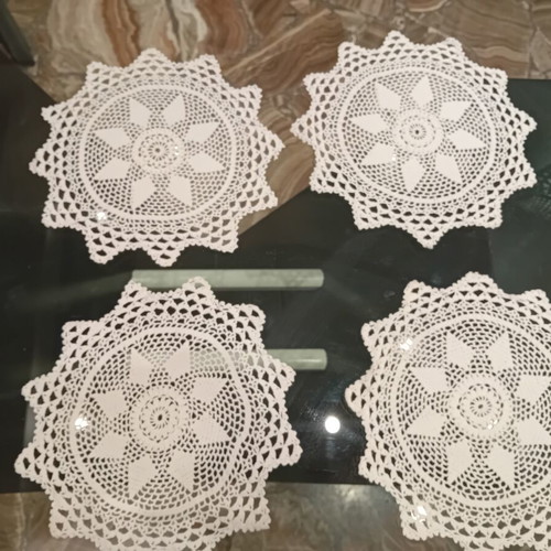 Handmade crochet doilies set of 9, star flower motif, 1965