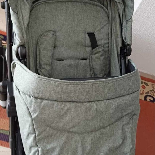 Twin stroller like new with footmuffs and carrycots