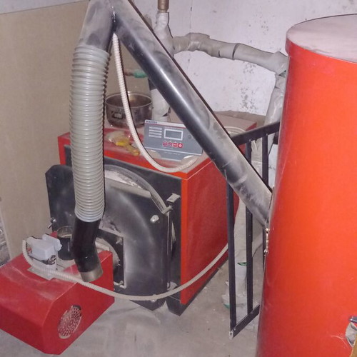 Pellet burner with chimney and 40 bags of pellet like new