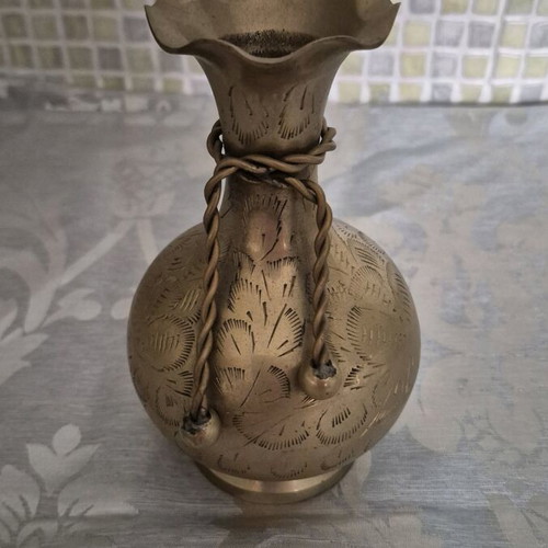 Vintage bronze vase used with engraved designs and rope detail