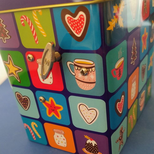 Christmas music box with winding key and festive designs