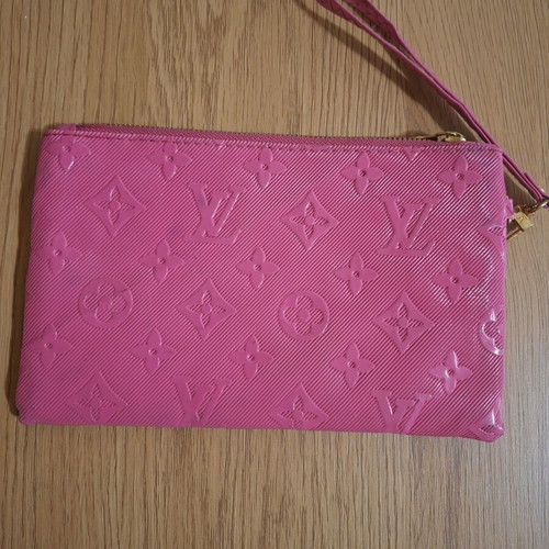 Pink wristlet bag with 3 compartments